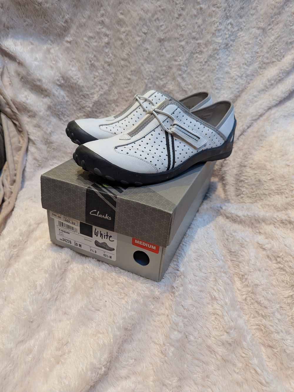 Clarks White Perforated Slip-On Loafers with Black Accents
